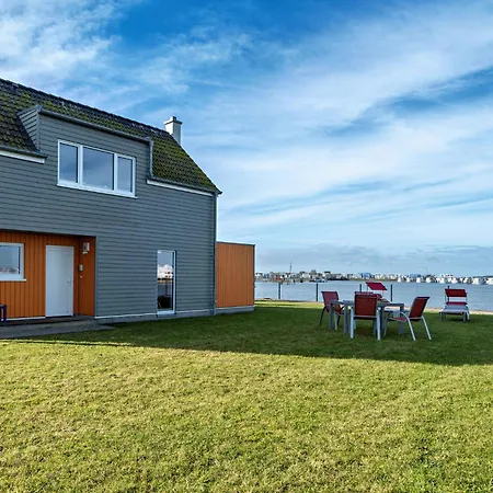 Hébergement de vacances Am By Seeblick Ferien Oro, Direkte Wasserlage,sauna,kamin